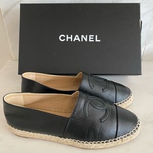 CHANEL black lambskin CC espadrilles.
